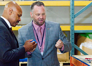 Detectamet CEO Sean Smith and VA Secretary of Commerce and Trade Maurice Jones.